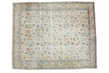 Distressed North West Persian carpet, ivory field with blue, saffron, rose floral patterns. 10'7