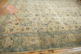 Distressed vintage North West Persian carpet with lattice field in ivory, saffron, and sky blue.