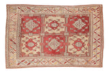Vintage Oushak carpet with cherry red, ivory, grey geometric floral panels, 5'5