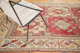 Oushak rug border with quatrefoil serrated leaf motifs in cherry red, ivory, and saffron.