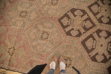 Vintage Jijim carpet featuring geometric lattice panels in faded wine red, chocolate brown, and antique ivory.