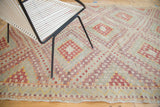 Repeating diamond atop diamond motif with aubergine, cherry red, and saffron yellow.