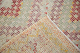 Hand-knotted vintage Jijim carpet reverse, revealing aubergine, ivory geometric diamond weave.