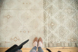 Distressed hand knotted Jijim rug displaying abrash with contrasting silver and charcoal geometric panels.