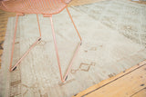 Distressed vintage Jijim rug with subtle ivory and silver geometric lattice pattern and abrash.