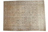 Distressed Tabriz carpet with allover floral vinery in beige, brown, and pale blue, measuring 11'2