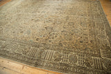 Distressed Tabriz carpet section featuring pale sand field, scrolling vinery, and willow tree border motifs.