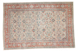 Distressed vintage Kaisary carpet, allover palmette floral design in ivory, pomegranate red, and teal.