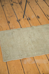 Evenly shorn pile texture of a vintage Oushak rug with subtle tone-on-tone geometric design.