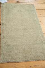 Oushak rug runner close-up of subtle geometric pattern and soft neutral pile.