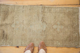 Hand-knotted Turkish Oushak rug surface with soft beige, ivory, and sea foam green abrash.