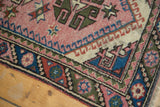 Blush field, starburst motifs, and barber polled border in sky blue and red.