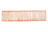 Vintage Distressed Oushak rug runner featuring blush and ivory lattice diamond quatrefoil floral pattern, 2'3