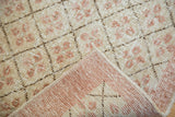Distressed Oushak rug runner: blush lattice pattern, visible texture, hand-knotted reverse.
