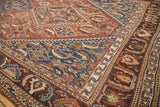 Vibrant sky blue field, stylized birds, and chestnut brown border of an Antique Qashqai runner.