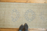 Hand knotted Turkish Oushak runner, repeating multi-medallion pattern in antique ivory and silver grey.