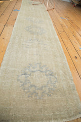Vintage Oushak runner with hand-knotted ivory and silver grey medallion pattern.