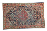 Distressed vintage Persian Mahal rug with brick red diamond medallion on indigo, 4'2