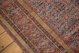 Antique Farahan runner, blush brick red border, dusty gold band, navy field, intricate henna motif.