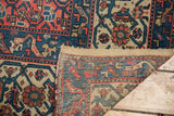Hand-knotted reverse construction and vibrant boteh pattern on antique Malayer runner.
