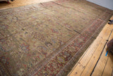Antique Mahal runner's expansive field with unusual dark moss green ground and floral palmettes.