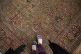Dark moss green antique Mahal rug pile, patterned with burgundy, slate blue, and gold floral motifs.