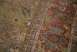Antique Mahal rug section with unusual moss green and copper burgundy fields and floral palmettes.