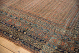 Antique Malayer runner: low pile, intricate navy border, and dusty brick red field design.