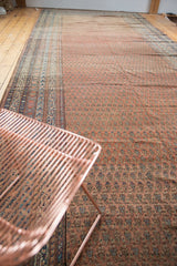 Antique Malayer runner featuring allover Mir boteh design in dusty red and blue tones.