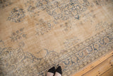 Hard distressed Sivas carpet featuring faded dusty teal Islimis and exposed foundation.