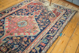 Distressed antique Josan Sarouk rug detail showing exposed foundation, bird figures.