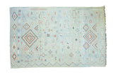 Pale powder blue Moroccan Kilim rug with geometric concentric diamonds and pinwheel motifs, 5'10