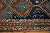 Vintage Kurdish runner's detailed border with stylized floral and geometric motifs.