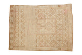 Distressed vintage Oushak rug, faded medallion and guls in ivory, sand, and faint blush, 4'3