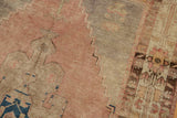 Distressed vintage Oushak runner, low dusty rose pile, with foundation showing through.