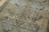 Antique distressed Malayer rug displaying softened ivory, beige, platinum tones and henna plant motif.