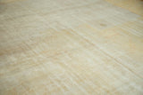 Antique distressed Oushak rug pile with mostly even wear to knot heads, ivory and sand.
