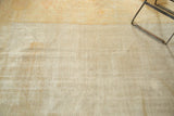Visible wear to knot heads and rewoven areas on distressed antique Oushak carpet.