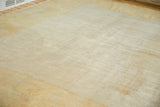 Distressed low pile with visible rewoven foundation and subtle ivory, sand tones.