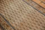 Beige and brown Mir cyprus tree pattern on a vintage Tabriz runner, navy Serbend border.