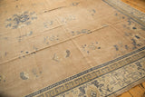 Distressed pale mauve field with cobalt blue running T and arts and crafts borders.
