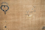 Distressed beige field with cobalt blue pictorial motifs on an antique Chinese rug.