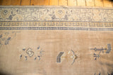 Chinese antique rug's cobalt blue running T, arts and crafts outlines, pale mauve field.