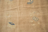 Distressed field detail of antique Chinese carpet with cobalt blue symbolic boxed plant motifs.