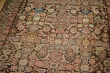 Blush and mauve Herati motif with a barber pole border on this Malayer runner.