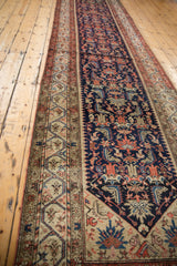 Vintage Malayer rug's sharp serrated Herati motif field and meandering border, navy, blush, beige.