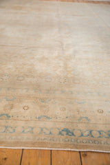 Distressed vintage Sivas carpet pile, muted pale bronze and soft blue Veramin motifs.