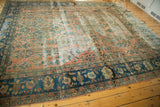 Antique Distressed Lilihan carpet, implied medallion and botanical motifs with extensive patina.