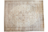 Vintage distressed Sparta carpet with faded ivory palmette medallion and floral vinery.