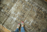 Distressed Kula runner showcasing geometric floral patterns in muted charcoal, gray, and beige.